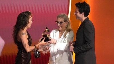 Meryl Streep, center, and Mark Ronson present Miley Cyrus with the prestigious award for record of the year for Flowers during the 66th annual Grammy Awards. In her acceptance speech, Miley said, “This award is amazing, but I really hope that it doesn’t change anything because my life was beautiful yesterday. Not everyone in the world will get a Grammy, but everyone in this world is spectacular. So, please don’t think that this is important — even though it’s very important.” (AP) Meryl Streep, center, and Mark Ronson present Miley Cyrus with the prestigious award for record of the year for Flowers during the 66th annual Grammy Awards. In her acceptance speech, Miley said, “This award is amazing, but I really hope that it doesn’t change anything because my life was beautiful yesterday. Not everyone in the world will get a Grammy, but everyone in this world is spectacular. So, please don’t think that this is important — even though it’s very important.” (AP)