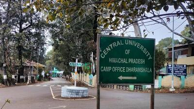 A signboard pointing to the Central University of Himachal Pradesh’s camp office that functions from a rented space in Dharamshala. (HT Photo) A signboard pointing to the Central University of Himachal Pradesh’s camp office that functions from a rented space in Dharamshala. (HT Photo)