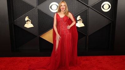 Scarlet was definitely the colour of the 2024 Grammys. Another red look came from Kylie Minogue, who wore a red strappy gown. Minogue's custom-made Dolce &amp; Gabbana dress had a flowing train attached to the sleeves. Strappy red heels and a bold red lip completed the look for the Australian singer.&nbsp;REUTERS/Mario Anzuoni ( REUTERS/Mario Anzuoni)