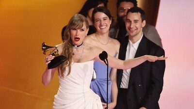 Taylor Swift accepts the award for Album of the Year for Midnights, becoming the artist with the most wins in the coveted category with four. Prior to her win of the coveted award, Taylor was tied with Frank Sinatra, Stevie Wonder and Paul Simon, who along with her all previously won album of the year three times. (REUTERS) 