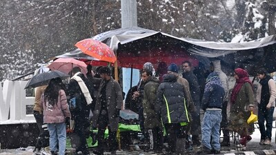 Despite snowfall between Banihal and Ramsoo in the Ramban district along the Srinagar-Jammu national highway on Sunday, the traffic department reported that the highway was open for traffic. (AFP) Despite snowfall between Banihal and Ramsoo in the Ramban district along the Srinagar-Jammu national highway on Sunday, the traffic department reported that the highway was open for traffic. (AFP)