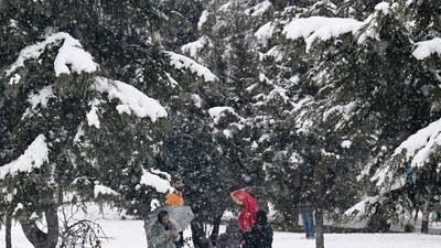 Srinagar, a renowned tourist spot and the summer capital of Jammu and Kashmir, appeared enchanting as the city was draped in a white blanket of snow early on Monday morning. Tourists were spotted enjoying snowball fights while parts of Rajouri experienced fresh snowfall. (AFP) Srinagar, a renowned tourist spot and the summer capital of Jammu and Kashmir, appeared enchanting as the city was draped in a white blanket of snow early on Monday morning. Tourists were spotted enjoying snowball fights while parts of Rajouri experienced fresh snowfall. (AFP)