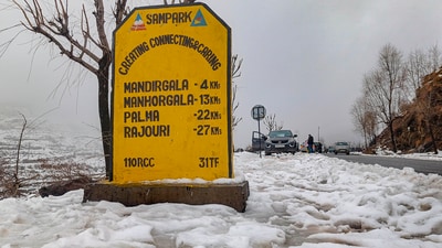 Earlier on Sunday, heavy snowfall led to the cancellation of all flights at the Srinagar airport. (PTI) Earlier on Sunday, heavy snowfall led to the cancellation of all flights at the Srinagar airport. (PTI)