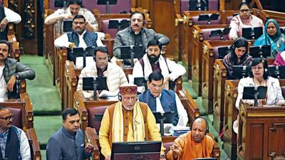 Uttar Pradesh finance minister Suresh Khanna presents the state budget in the U.P. assembly in Lucknow on Monday. (Deepak Gupta/HT Photo)
