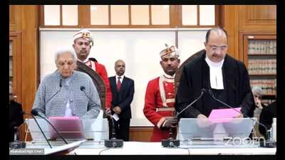 Uttar Pradesh governor Anandiben Patel on Monday administered oath to Justice Arun Bhansali as the Chief Justice of Allahabad High Court. (HT Photo) Uttar Pradesh governor Anandiben Patel on Monday administered oath to Justice Arun Bhansali as the Chief Justice of Allahabad High Court. (HT Photo)
