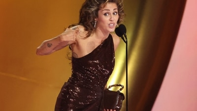 Miley Cyrus accepts the award for Record of the Year for Flowers during the 66th Annual Grammy Awards. (REUTERS)