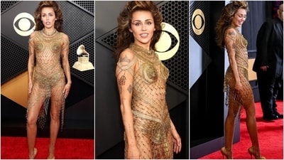 Miley Cyrus turned heads with a voluminous updo and a Maison Margiela gown that appeared to be constructed entirely of gold safety pins. The custom creation was inspired by John Galliano's Fall-Winter 1996 look. Lastly, she glammed up the see-through look with gold velvet Tabi heels, winged eyeliner, and nude lips.&nbsp; (Instagram)