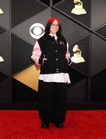 Billie Eilish poses on the red carpet as she attends the 66th Annual Grammy Awards in Los Angeles, California, U.S. (REUTERS/Mario Anzuoni)