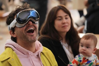 A customer tries his Vision Pro at the launch of the Apple Vision Pro at Apple The Grove in Los Angeles, California, on February 2, 2024. The Vision Pro, the tech giant's $3,499 headset, is its first major release since the Apple Watch nine years ago. (Photo by David SWANSON / AFP) (AFP) A customer tries his Vision Pro at the launch of the Apple Vision Pro at Apple The Grove in Los Angeles, California, on February 2, 2024. The Vision Pro, the tech giant's $3,499 headset, is its first major release since the Apple Watch nine years ago. (Photo by David SWANSON / AFP) (AFP)