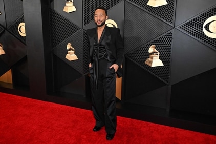 US singer-songwriter John Legend arrives for the 66th Annual Grammy Awards at the Crypto.com Arena in Los Angeles. (Photo by Robyn BECK / AFP) US singer-songwriter John Legend arrives for the 66th Annual Grammy Awards at the Crypto.com Arena in Los Angeles. (Photo by Robyn BECK / AFP)