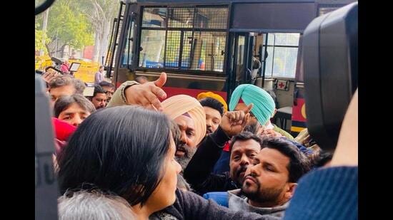 Aam Aadmi Party councillors being taken away from outside the municipal corporation office in Chandigarh on Monday. (Ravi Kumar/HT)