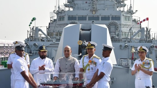 Union defence minister Rajnath Singh, Maharashtra CM Eknath Shinde along with officers on INS Imphal, during its commissioning ceremony into the Indian Navy at Mumbai naval base (Bhushan Koyande/ HT) (HT_PRINT)
