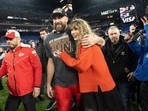 FILE - Kansas City Chiefs tight end Travis Kelce and Taylor Swift walk together after an AFC Championship NFL football game between the Chiefs and the Baltimore Ravens, Jan. 28, 2024, in Baltimore.. Taylor Swift, who is holding concerts in Japan, will make it in time for the Super Bowl to see her partner and football superstar Travis Kelce play. (AP Photo/Julio Cortez, File) FILE - Kansas City Chiefs tight end Travis Kelce and Taylor Swift walk together after an AFC Championship NFL football game between the Chiefs and the Baltimore Ravens, Jan. 28, 2024, in Baltimore.. Taylor Swift, who is holding concerts in Japan, will make it in time for the Super Bowl to see her partner and football superstar Travis Kelce play. (AP Photo/Julio Cortez, File)
