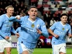 Manchester City's Phil Foden celebrates scoring their second goal with Erling Braut Haaland and Julian Alvarez