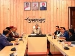 Uttarakhand chief minister Pushkar Singh Dhami chairs a cabinet meeting at his residence in Dehradun on Sunday. Uttarakhand chief minister Pushkar Singh Dhami chairs a cabinet meeting at his residence in Dehradun on Sunday.