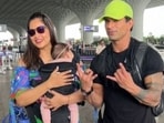 Bipasha Basu, Karan Singh Grover with their daughter Devi at Mumbai airport,
