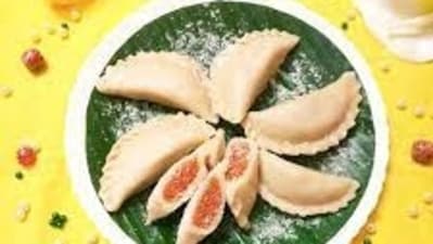 Chandrapuli: A sweet delicacy made with coconut, jaggery, and rice flour, shaped like a crescent moon, symbolizing creativity and artistic expression. (Instagram/@flavourfuldessert) Chandrapuli: A sweet delicacy made with coconut, jaggery, and rice flour, shaped like a crescent moon, symbolizing creativity and artistic expression. (Instagram/@flavourfuldessert)