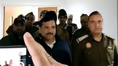 Aam Aadmi Party leader Sanjay Singh in police custody. (ANI File Photo) Aam Aadmi Party leader Sanjay Singh in police custody. (ANI File Photo)
