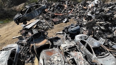Burnt cars destroyed after the wildfires are sorted at a landfill in Villa Independencia, Valparaiso region in Chile on February 5. (AFP) Burnt cars destroyed after the wildfires are sorted at a landfill in Villa Independencia, Valparaiso region in Chile on February 5. (AFP)