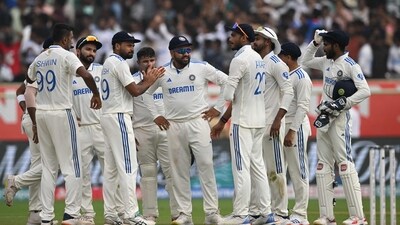 India's captain Rohit Sharma (C) speaks with his teammates after the wicket of England's Ollie Pope during the fourth day of the second Test cricket match between India and England at the Y.S. Rajasekhara Reddy Cricket Stadium in Visakhapatnam (AFP) India's captain Rohit Sharma (C) speaks with his teammates after the wicket of England's Ollie Pope during the fourth day of the second Test cricket match between India and England at the Y.S. Rajasekhara Reddy Cricket Stadium in Visakhapatnam (AFP)