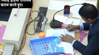 In the second clip, Masih is purportedly seen making some marks on the right hand side of eight ballot papers. (HT Photo)
