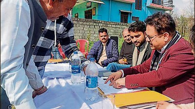 Public hearing underway at Jhikli Ichii in Kangra on Tuesday. (HT)