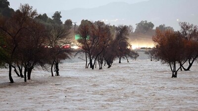 The Los Angeles River flows while swollen by storm runoff as a powerful long-duration atmospheric river storm, the second in less than a week, continues to impact Southern California on February 5. (Getty Images via AFP) The Los Angeles River flows while swollen by storm runoff as a powerful long-duration atmospheric river storm, the second in less than a week, continues to impact Southern California on February 5. (Getty Images via AFP)
