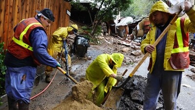 Rescue crews were retrieving individuals from swiftly flowing water in different areas of Southern California on Monday. (Getty Images via AFP) Rescue crews were retrieving individuals from swiftly flowing water in different areas of Southern California on Monday. (Getty Images via AFP)