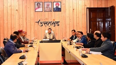 Uttarakhand chief minister Pushkar Singh Dhami chairs a cabinet meeting at his residence in Dehradun on Sunday. (HT_PRINT)