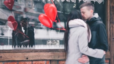 Kiss Day (February 13): Create a photo booth at home with props and a backdrop, and capture fun and memorable moments together, sealing each one with a kiss.&nbsp; (Unsplash)