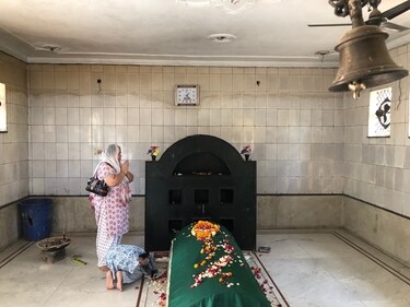 The dargah lies close to a residential complex. One afternoon most visitors happen to be women. (Mayank Austen Soofi)