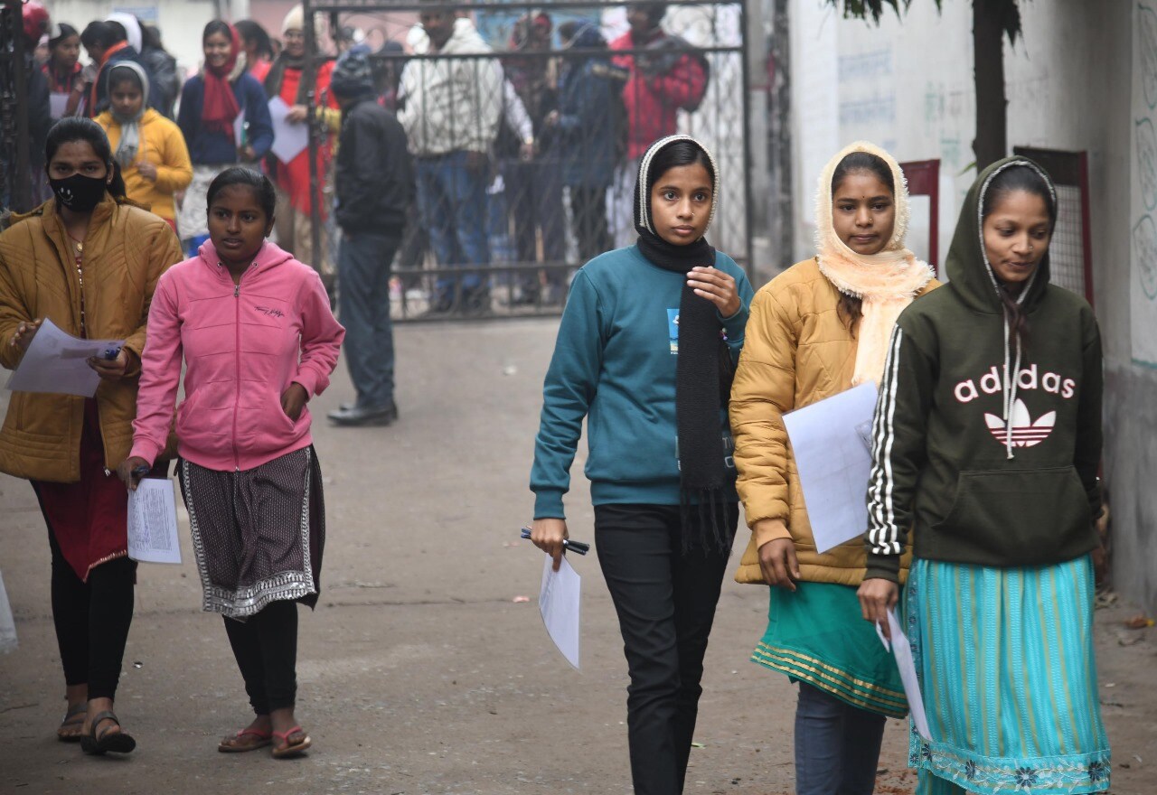 Students standing in queue to appear in the Bihar Board class 12th examination at DAV High School Danapur in Patna
Photo by Santosh Kumar