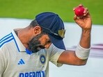 India's bowler Jasprit Bumrah, who took 6 wickets, shows the ball at the end of the first innings of England India's bowler Jasprit Bumrah, who took 6 wickets, shows the ball at the end of the first innings of England