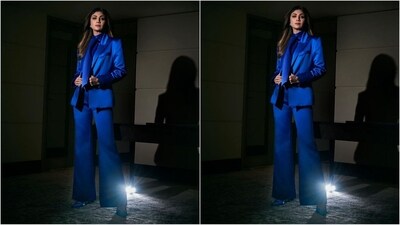 Assisted by celebrity fashion stylist Meagan Concessio, Shilpa styled her chic look with a pair of diamond studded statement earrings, multiple rings adorning her finger and a pair of blue pumps that perfectly complemented her head-turning look. (Instagram/@theshilpashetty) Assisted by celebrity fashion stylist Meagan Concessio, Shilpa styled her chic look with a pair of diamond studded statement earrings, multiple rings adorning her finger and a pair of blue pumps that perfectly complemented her head-turning look. (Instagram/@theshilpashetty)