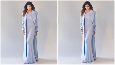 She styled her look with a floor-length jacket and diamond stud earrings. With her hair styled in soft waves and a glam make-up look that included kohl eyes, black eyeliner, mascaraed lashes, contoured cheeks and a nude brown lipstick shade, she completed the look. (Instagram/@theshilpashetty) She styled her look with a floor-length jacket and diamond stud earrings. With her hair styled in soft waves and a glam make-up look that included kohl eyes, black eyeliner, mascaraed lashes, contoured cheeks and a nude brown lipstick shade, she completed the look. (Instagram/@theshilpashetty)