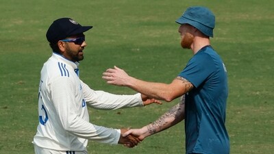 India's Rohit Sharma shakes hands with England's Ben Stokes after the match (REUTERS)