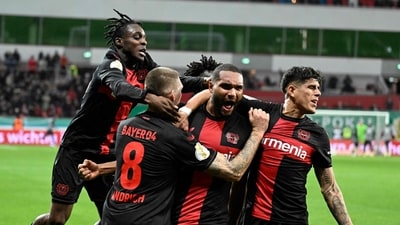 Bayer Leverkusen's German defender Jonathan Tah (2nd R) celebrates scoring the 3-2 winning goal with his team-mates during the German Cup (DFB Pokal) quarter-final (AFP) Bayer Leverkusen's German defender Jonathan Tah (2nd R) celebrates scoring the 3-2 winning goal with his team-mates during the German Cup (DFB Pokal) quarter-final (AFP)