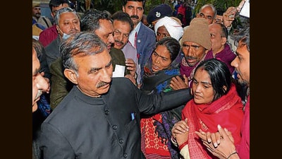 Hiamchal Pradesh chief minister Sukhvinder Singh Sukhu meeting the bereaved families in Solan on Wednesday. (HT Photo)