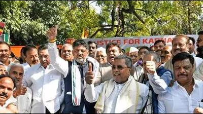 Karnataka chief minister Siddaramaiah and his deputy, DK Shivakumar, leading a protest against the Centre in New Delhi. (ANI)