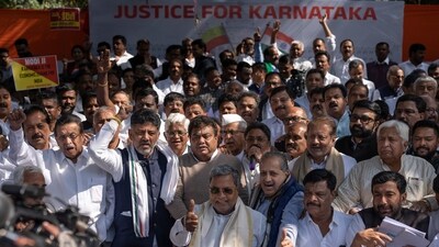 Karnataka chief minister Siddaramaiah and his deputy DK Shivakumar at a protest in Delhi to denounce the Centre’s alleged 'injustice' in tax devolution and grants-in-aid to the state (AP) Karnataka chief minister Siddaramaiah and his deputy DK Shivakumar at a protest in Delhi to denounce the Centre’s alleged 'injustice' in tax devolution and grants-in-aid to the state (AP)