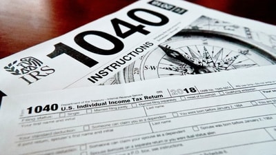 FILE- Internal Revenue Service taxes forms are seen on Feb. 13, 2019. If you have unpaid or unfiled taxes, the start of a new tax season and the looming reminders of debt might fill you with dread. But it’s best to take care of back taxes sooner rather than later: The longer you put off the task, the more you’ll pay in interest and penalties. Even if you can’t pay in full, you can still take meaningful steps toward addressing the debt. To handle your overdue taxes, read any tax notices you’ve received, set up a payment plan, contact a professional for complicated situations and remember to file a return for the current year. (AP Photo/Keith Srakocic, File) (AP) FILE- Internal Revenue Service taxes forms are seen on Feb. 13, 2019. If you have unpaid or unfiled taxes, the start of a new tax season and the looming reminders of debt might fill you with dread. But it’s best to take care of back taxes sooner rather than later: The longer you put off the task, the more you’ll pay in interest and penalties. Even if you can’t pay in full, you can still take meaningful steps toward addressing the debt. To handle your overdue taxes, read any tax notices you’ve received, set up a payment plan, contact a professional for complicated situations and remember to file a return for the current year. (AP Photo/Keith Srakocic, File) (AP)