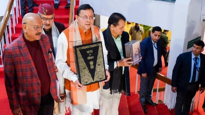 Uttarakhand Chief Minister Pushkar Singh Dhami with others holds a copy of the Constitution of India, at Vidhan Sabha Bhawan, in Dehradun. (PTI) Uttarakhand Chief Minister Pushkar Singh Dhami with others holds a copy of the Constitution of India, at Vidhan Sabha Bhawan, in Dehradun. (PTI)