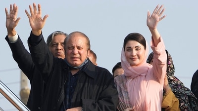 Pakistan's former Prime Minister Nawaz Sharif, center, and his daughter Maryam Nawaz, right, waves to their supporters as they arrive to address an election campaign rally in Hafizabad, Pakistan, on Jan. 18, 2024. (AP)