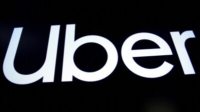 FILE PHOTO: A screen displays the company logo for Uber Technologies Inc. on the day of it's IPO at the New York Stock Exchange (NYSE) in New York, US. (REUTERS)
