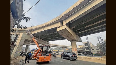 Work in progress on the elevated road near Bharat Nagar Chowk. (HT)