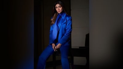 With the help of make-up artist Ajay Shelar, Shilpa wore nude eyeshadow, winged eyeliner, mascaraed eyelashes, darkened eyebrows, contoured cheeks, luminous highlighter and a shade of nude lipstick. Her lush locks were styled in soft curls and left open at the centre to complete her stunning look. (Instagram/@theshilpashetty) With the help of make-up artist Ajay Shelar, Shilpa wore nude eyeshadow, winged eyeliner, mascaraed eyelashes, darkened eyebrows, contoured cheeks, luminous highlighter and a shade of nude lipstick. Her lush locks were styled in soft curls and left open at the centre to complete her stunning look. (Instagram/@theshilpashetty)