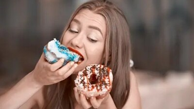 Eating sugary, salty and highly processed food items on a regular basis, or while binge-watching shows is also a sign of Dopamine chasing. (Unsplash) Eating sugary, salty and highly processed food items on a regular basis, or while binge-watching shows is also a sign of Dopamine chasing. (Unsplash)