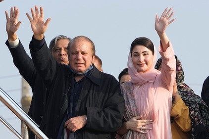 Pakistan's former Prime Minister Nawaz Sharif, center, and his daughter Maryam Nawaz, right, waves to their supporters as they arrive to address an election campaign rally in Hafizabad, Pakistan, on Jan. 18, 2024. (AP) Pakistan's former Prime Minister Nawaz Sharif, center, and his daughter Maryam Nawaz, right, waves to their supporters as they arrive to address an election campaign rally in Hafizabad, Pakistan, on Jan. 18, 2024. (AP)