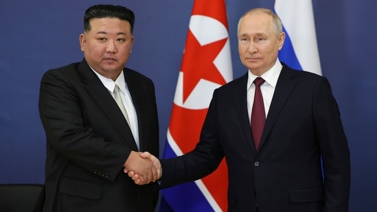 Russian President Vladimir Putin (right) and North Korea's leader Kim Jong Un (AP)