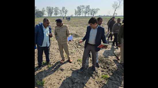 Several police teams including superintendent of police (SP) Shashank Kumar Sawan, DSP Nayab Singh and forensic teams reached the crime scene. (HT Photo)